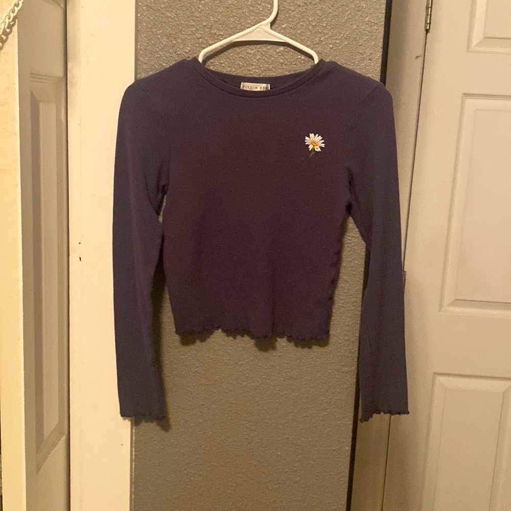 This is a long sleeve crop top and is great for the summer.